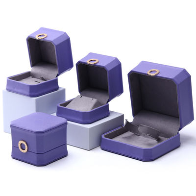주문 매혹적인 보라색 팔각형 PU 가죽 보석 상자 online manufacture